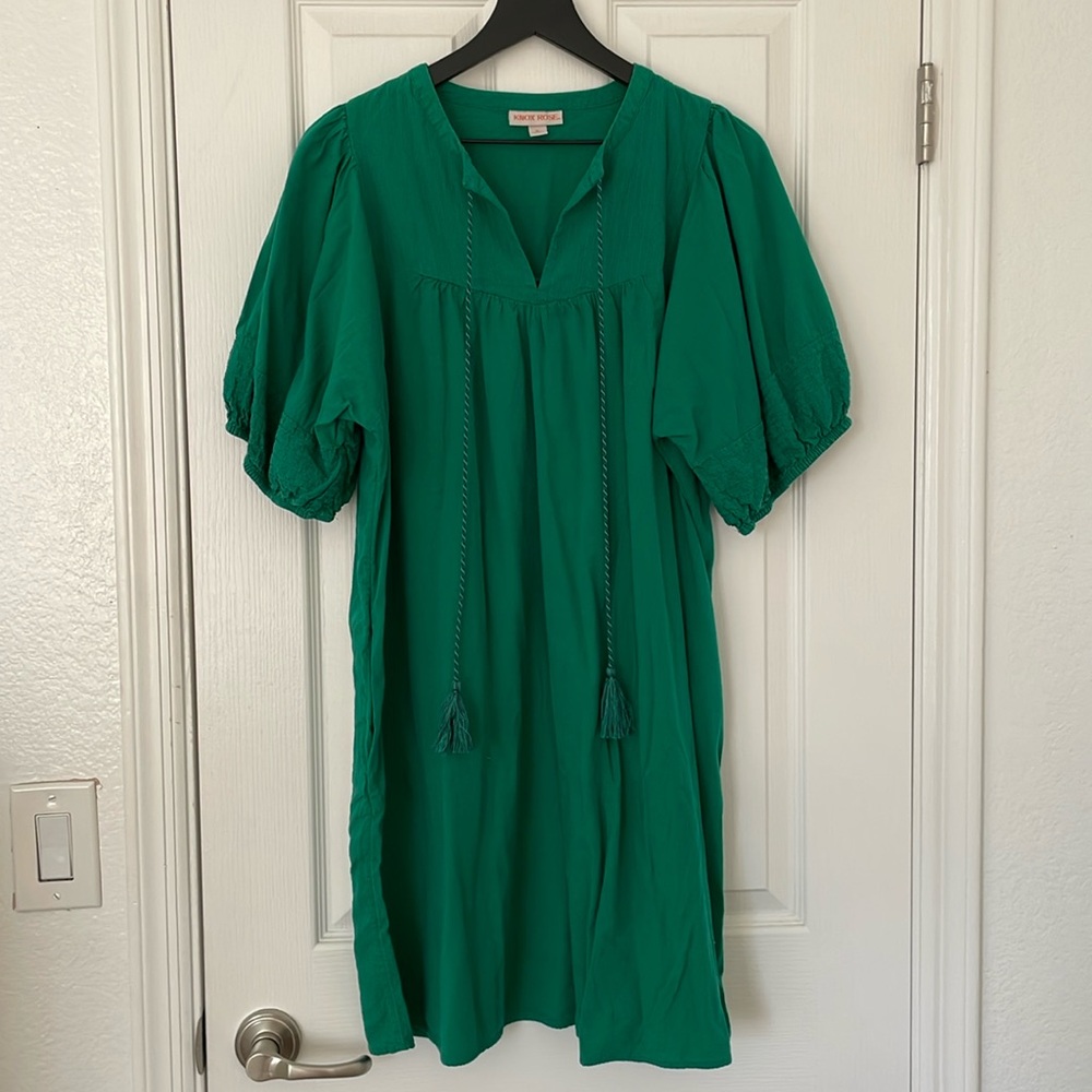 Green mini dress with pockets